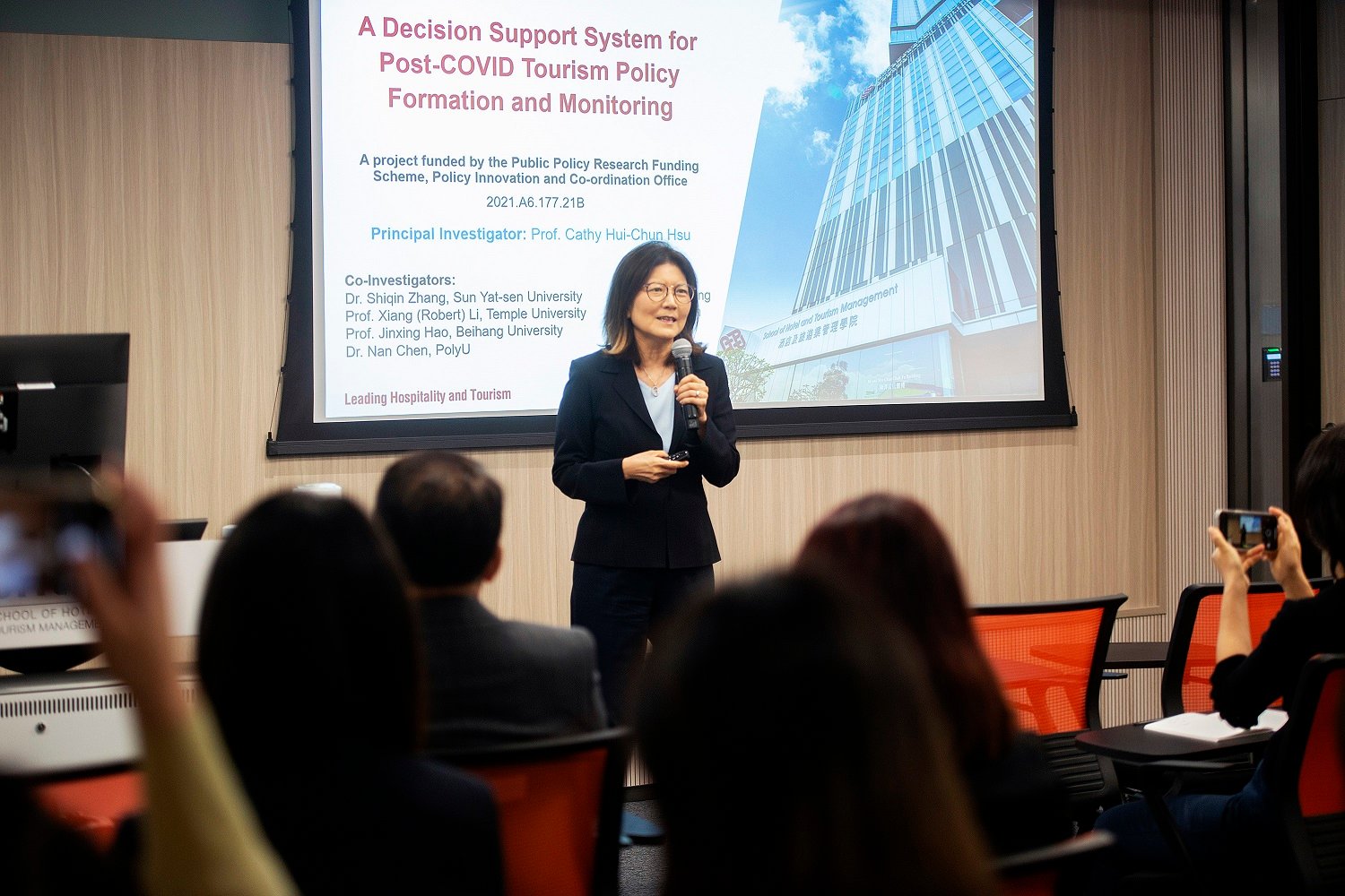 Prof Cathy Hsu, Principal Investigator and SHTM Chair Professor presenting findings of a study on “A Decision Support System for Post-COVID Tourism Policy Formation and Monitoring”.

— Photo by Hong Kong Poly