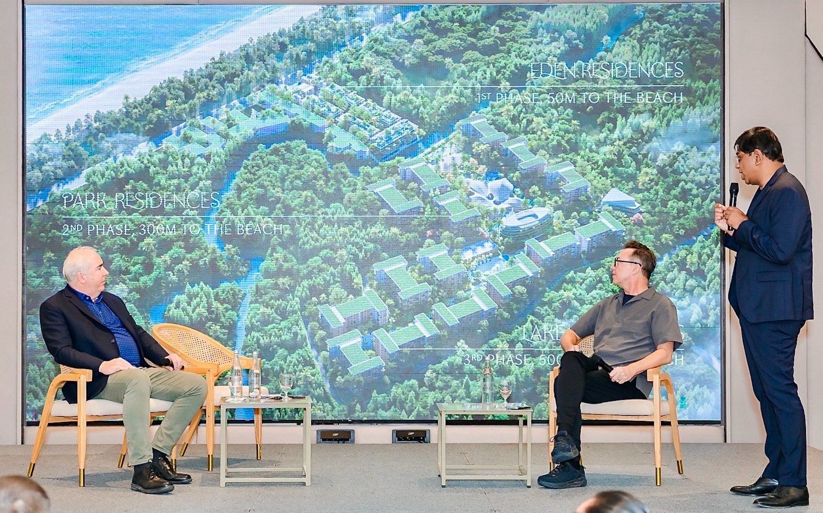 Ravi Chandran introduces Gardens of Eden at an event. This is a prestigious nature-inspired luxury project located on Phuket's Bang Tao Beach, with 30% of the land area developed and 70% set aside for parks, lakes and gardens. —(Author) Photo C9 Hotel Works Co., Ltd.