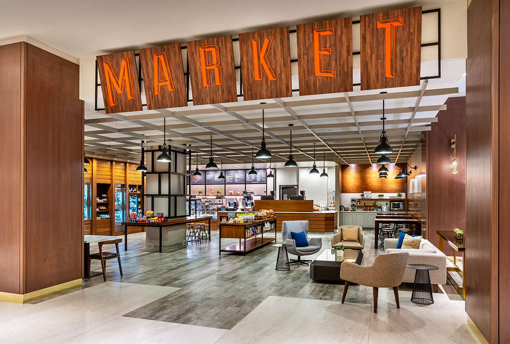 The market at the Hyatt Regency in Jacksonville, Florida features easy grab 'n’ go offerings for guests to enjoy.— Photo by Nehmer and HVS Design